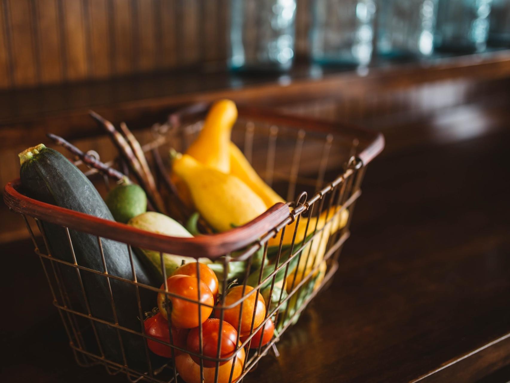 selective focus photography of vegetables in basket